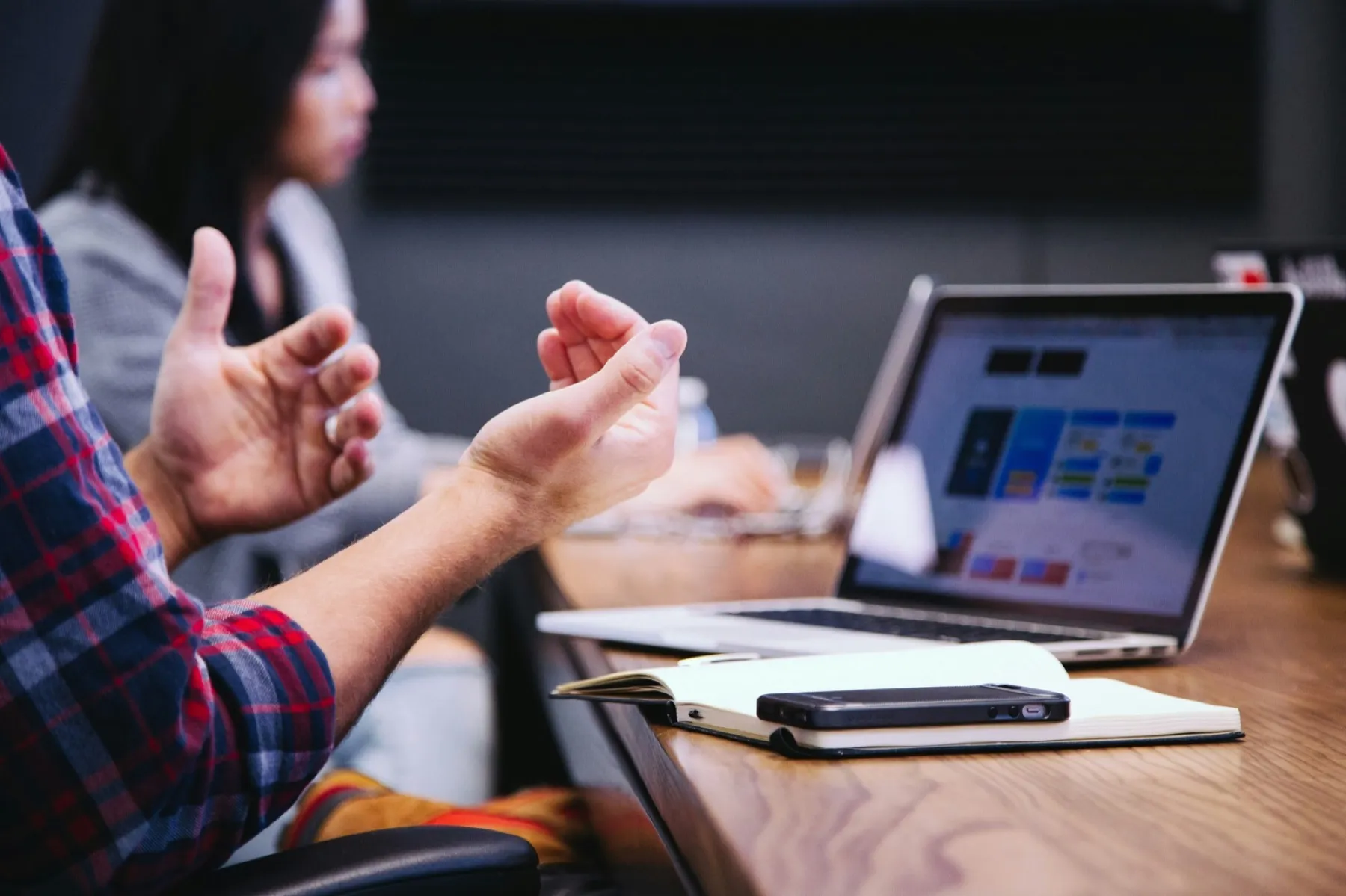 A sales team reviewing a deal together